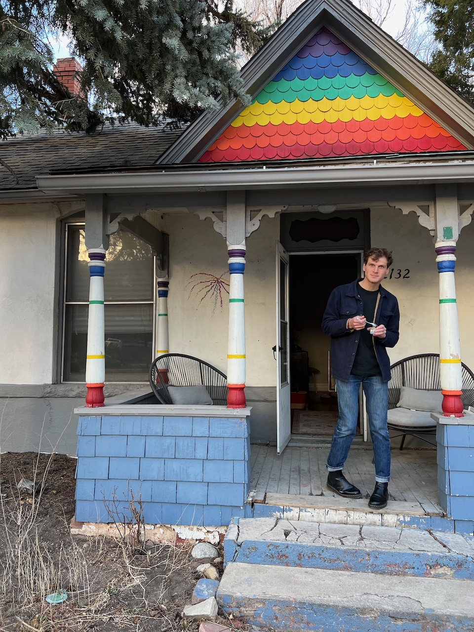 Johnny at a colorful house